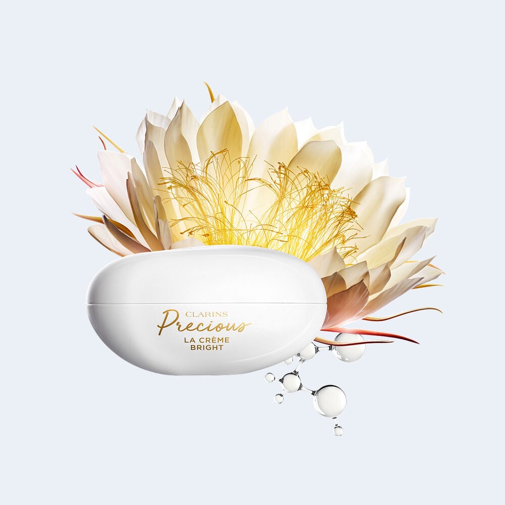 Packshot of Clarins Precious Bright Cream, surrounded by Moonlight Flower and Peptide Molecules, illustrating key ingredients for anti-aging.