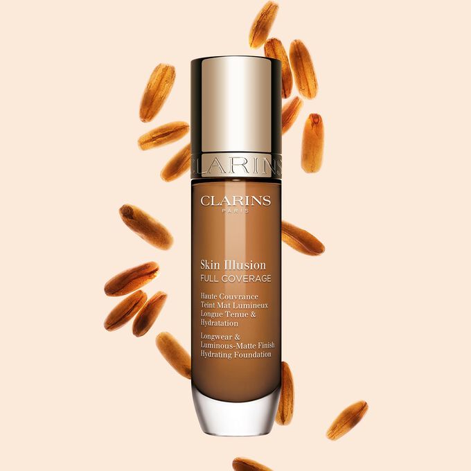 Clarins Skin Illusion Full Coverage showcasing its sleek design and vibrant packaging, the ideal foundation for a flawless & natural complexion.