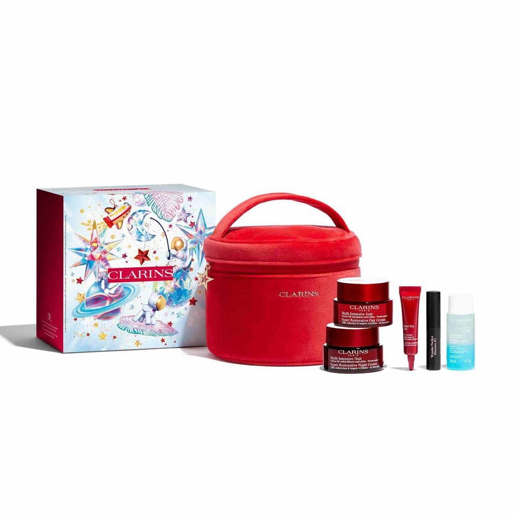 Packshot of the components of Clarins Super Restorative Holiday Season Gift Set: package, vanity pouch, and selected products.