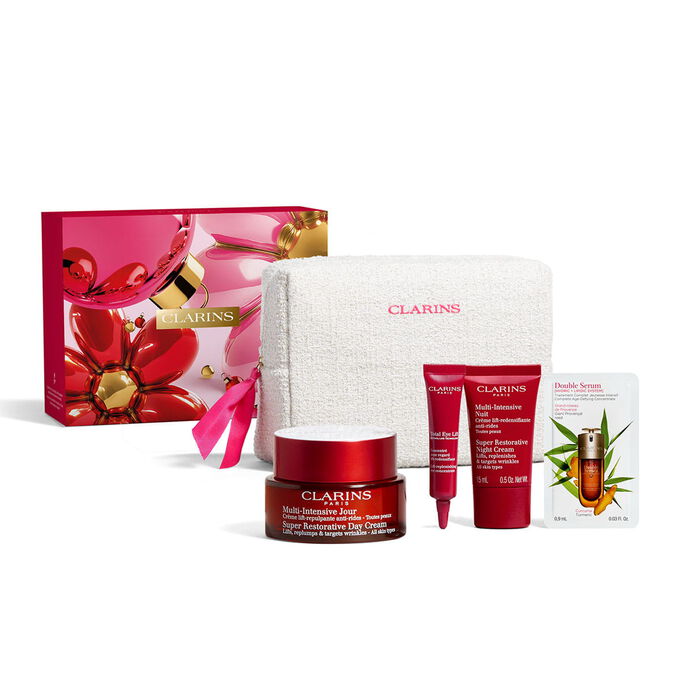 Clarins anti ageing skincare set with retinol like day cream total eye lift and night cream for mature skin in a pouch.