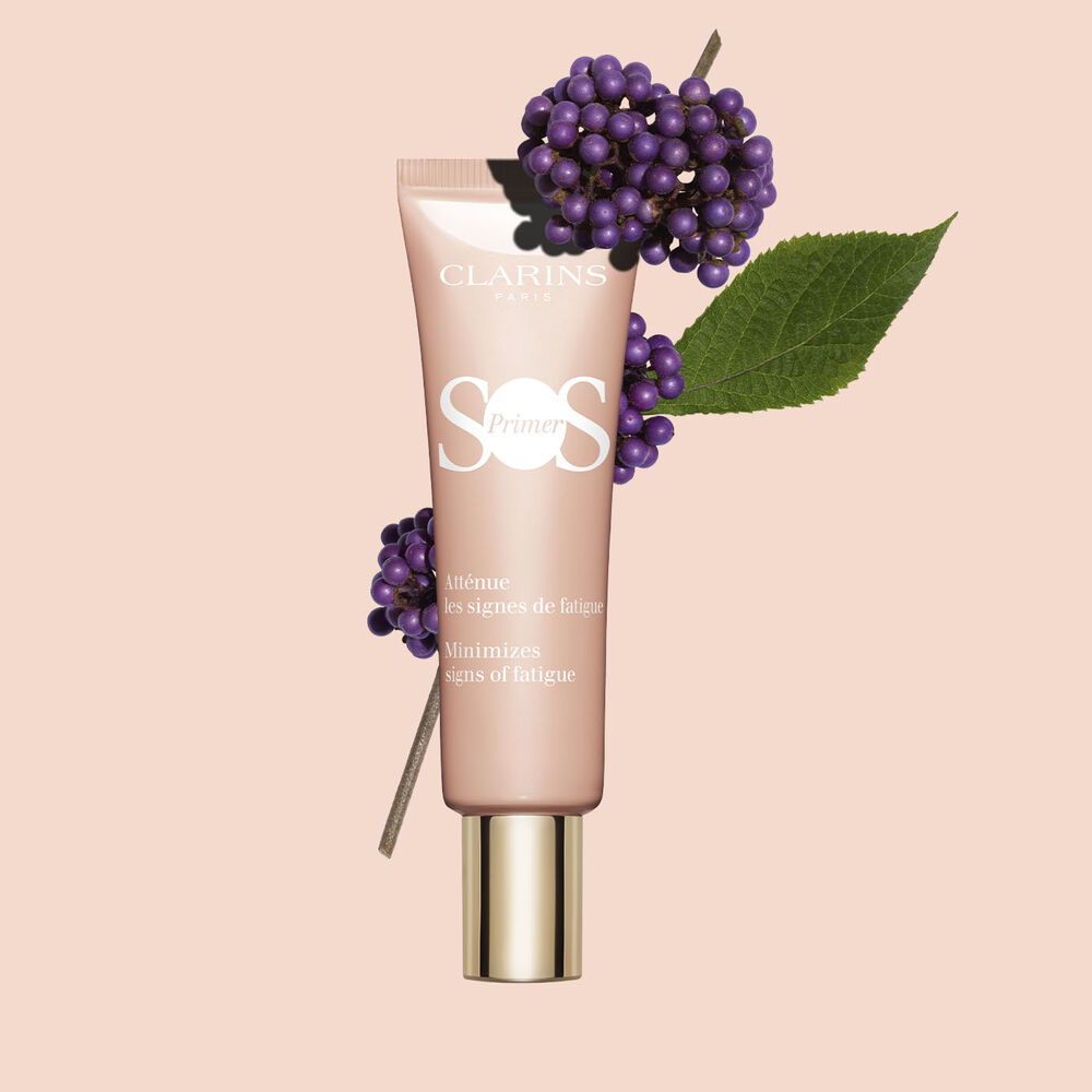 Tube of SOS Primer Pink by Clarins, featuring beautyberries, to minimise fatigue and boost radiance.