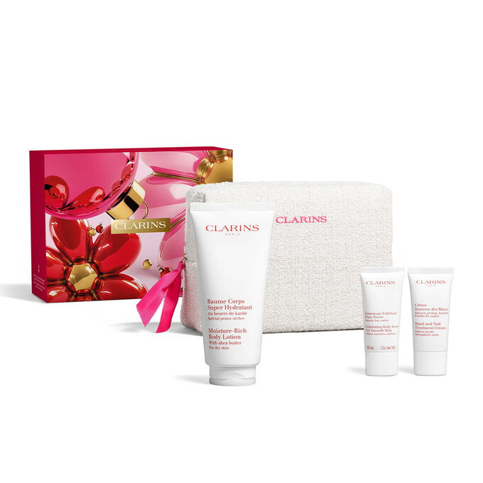 Hydrating body care gift set featuring full size body lotion body scrub and hand cream inside a floral cosmetic pouch.