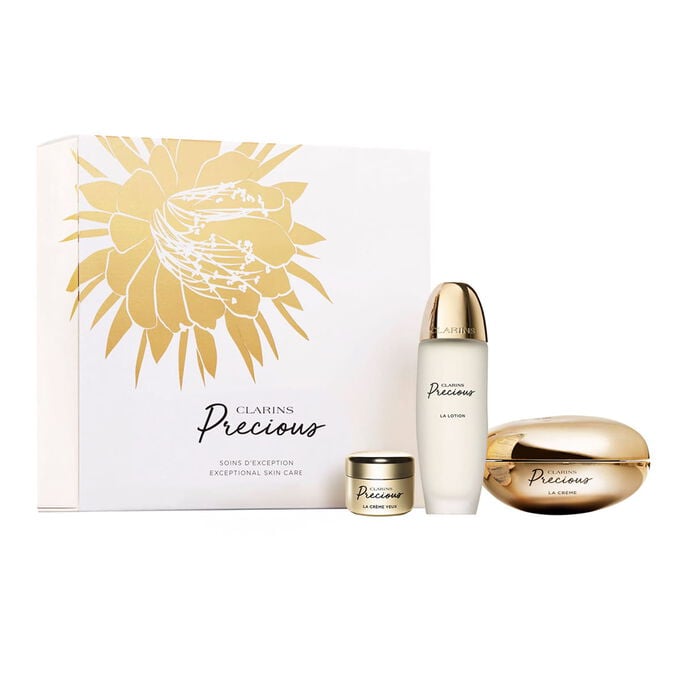 Clarins precious luxury peptide skincare set featuring full size face cream lotion and eye care in an elegant white box.
