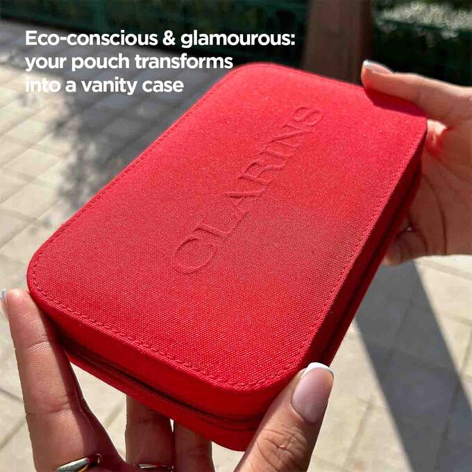 Close-up of the pouch, showcasing its red design and its ability to transform into a vanity case.