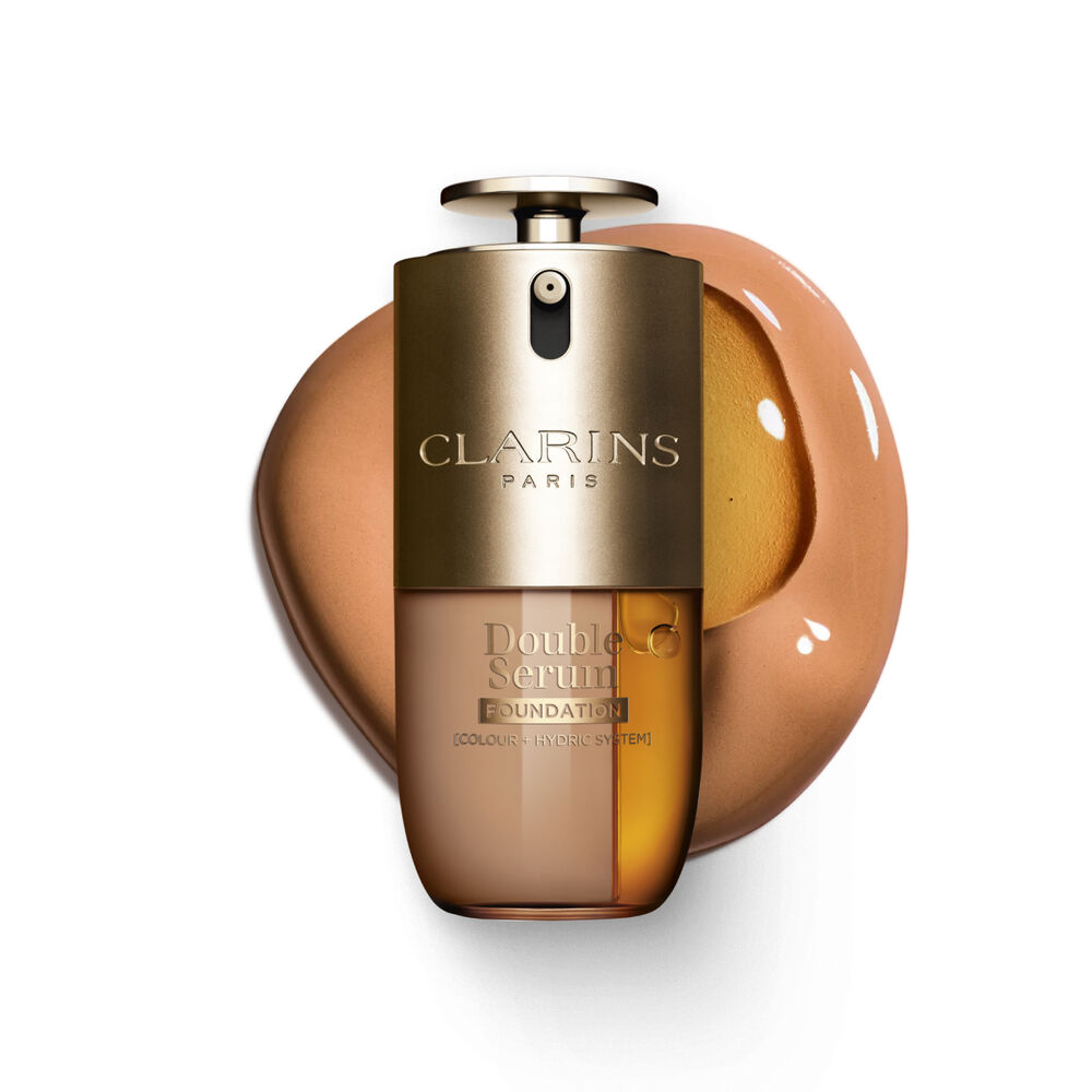 Packshot of Clarins Double Serum Foundation available for every skin tone, featuring key ingredients turmeric and papain 
