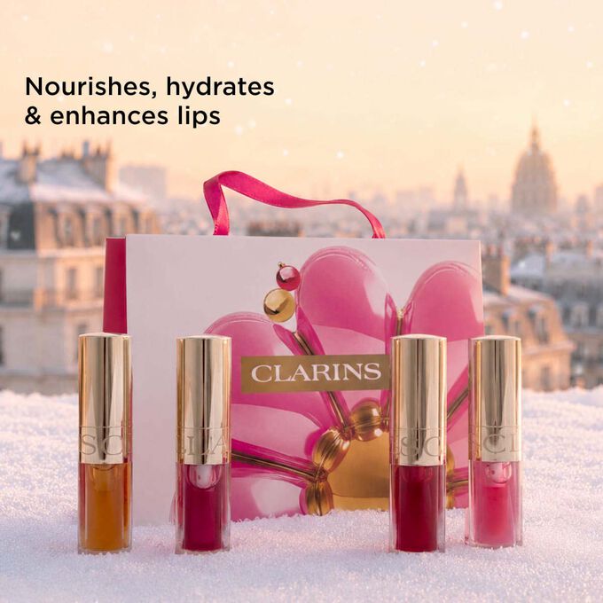 Packshot of Clarins Christmas beauty gift set highlighting lip oils that nourish, hydrate, and enhance lips with natural shine