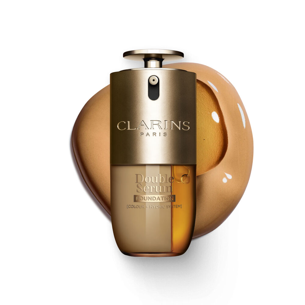 Packshot of Clarins Double Serum Foundation available for every skin tone, featuring key ingredients turmeric and papain 