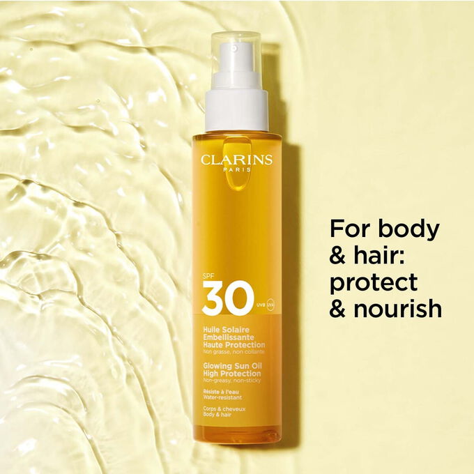 Packshot on textured background of sun oil 30+ for hair & body spray with text about its protecting and nourishing effects