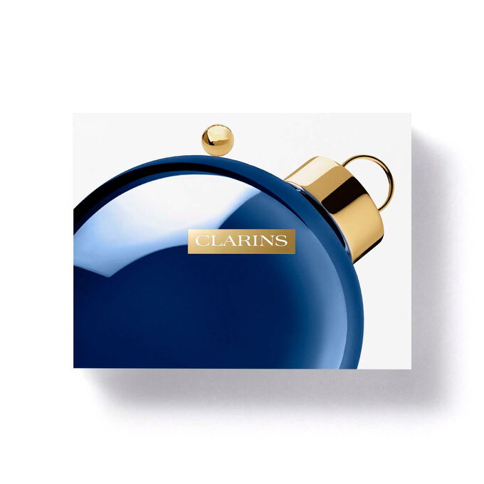 Packshot of Clarins Christmas gift pack with eco-friendly packaging, emphasizing sustainability and thoughtful gift-giving.
