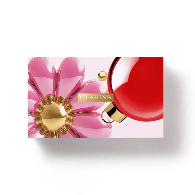 Clarins floral eco designed gift box packaging featuring pink flowers for a multi active 30s first wrinkles skincare set.