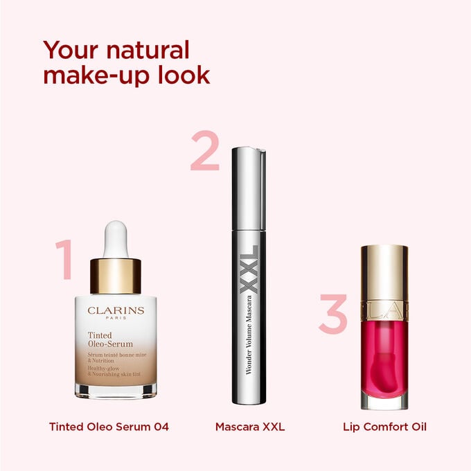 Clarins make-up selection for achieving a natural look, featuring a tinted serum, volumising mascara and lip oil.
