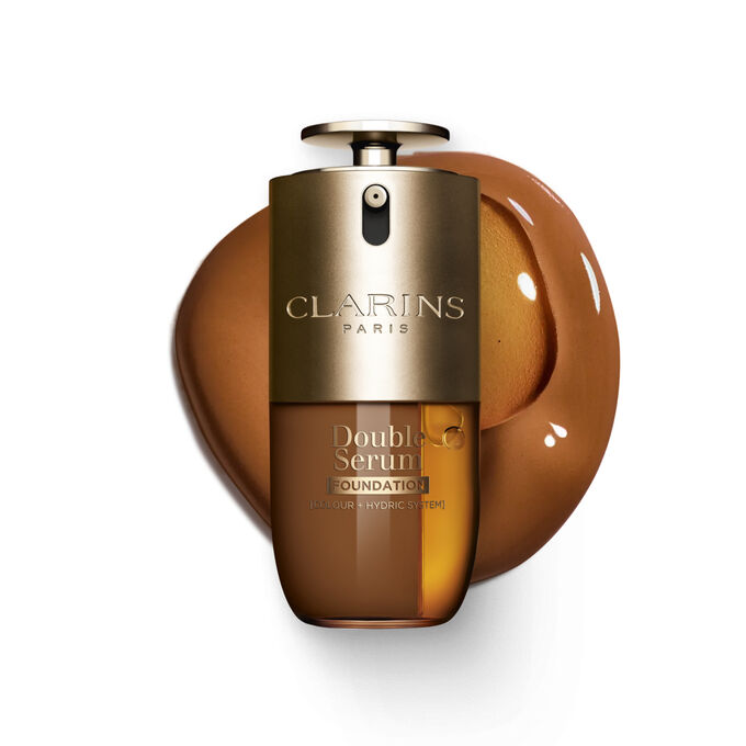 Packshot of Clarins Double Serum Foundation available for every skin tone, featuring key ingredients turmeric and papain 