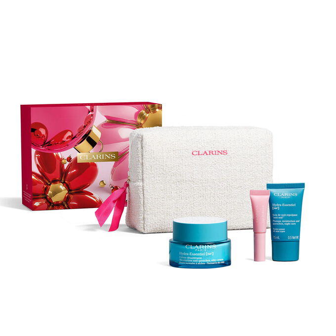 Clarins hydrating skincare gift set with hydra essentiel cream lip perfector and night care inside a floral beauty pouch.