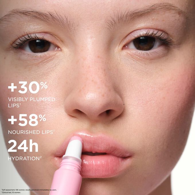 Woman applying Plumping Lip Perfector, highlighting  plumped lips and nourished lips effect, and 24h hydration benefits.