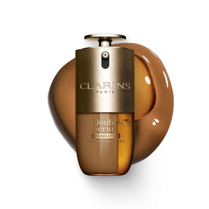 Packshot of Clarins Double Serum Foundation available for every skin tone, featuring key ingredients turmeric and papain 
