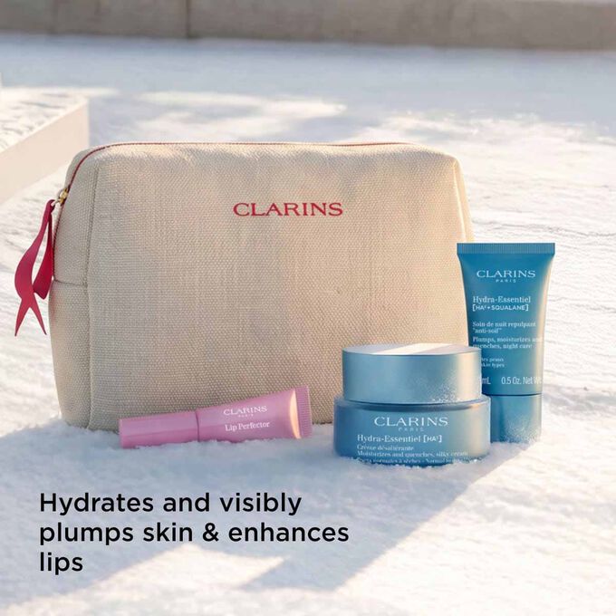 Clarins hydrating skincare set pouch with hydra essentiel products promising to hydrate plump skin and enhance lips glow.