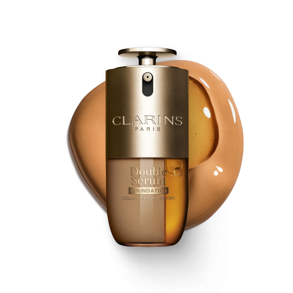 Packshot of Clarins Double Serum Foundation available for every skin tone, featuring key ingredients turmeric and papain 