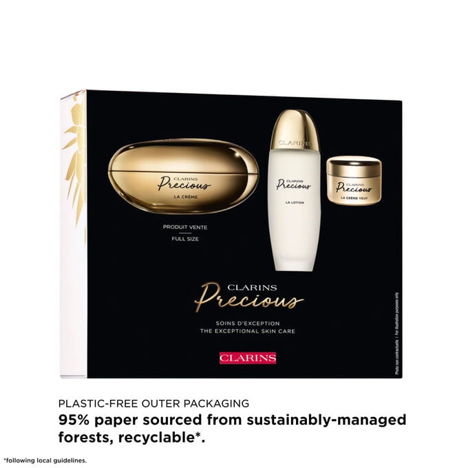 Plastic free recyclable paper packaging housing luxury anti ageing peptide skincare set with full size creams care.