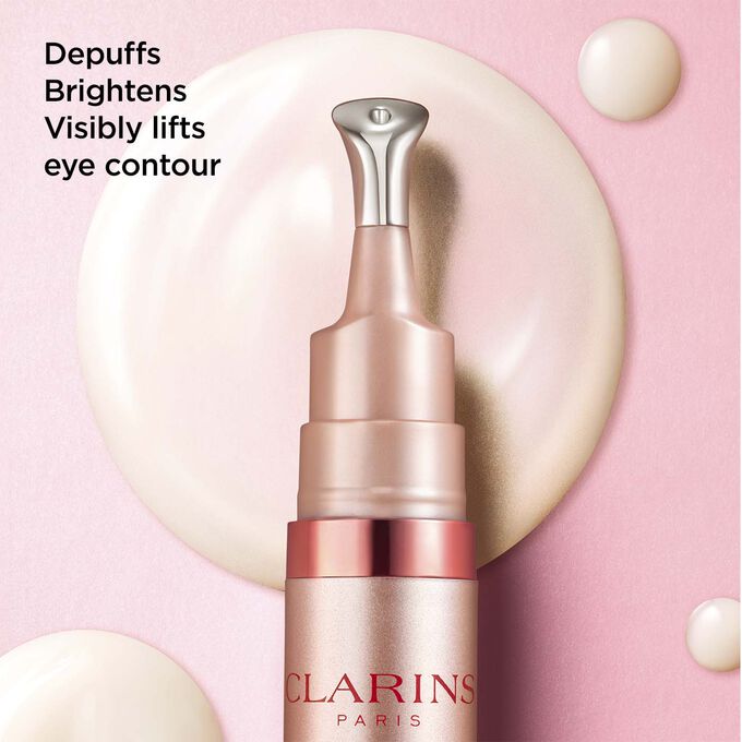 Clarins V Shaping Facial Lift Eye cream, with text highlighting its depuffing, brightening, and lifting effects on eye contour.
