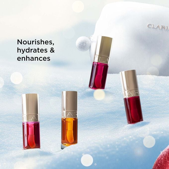 Packshot of Clarins Christmas beauty gift set highlighting lip oils that nourish, hydrate, and enhance lips with natural shine