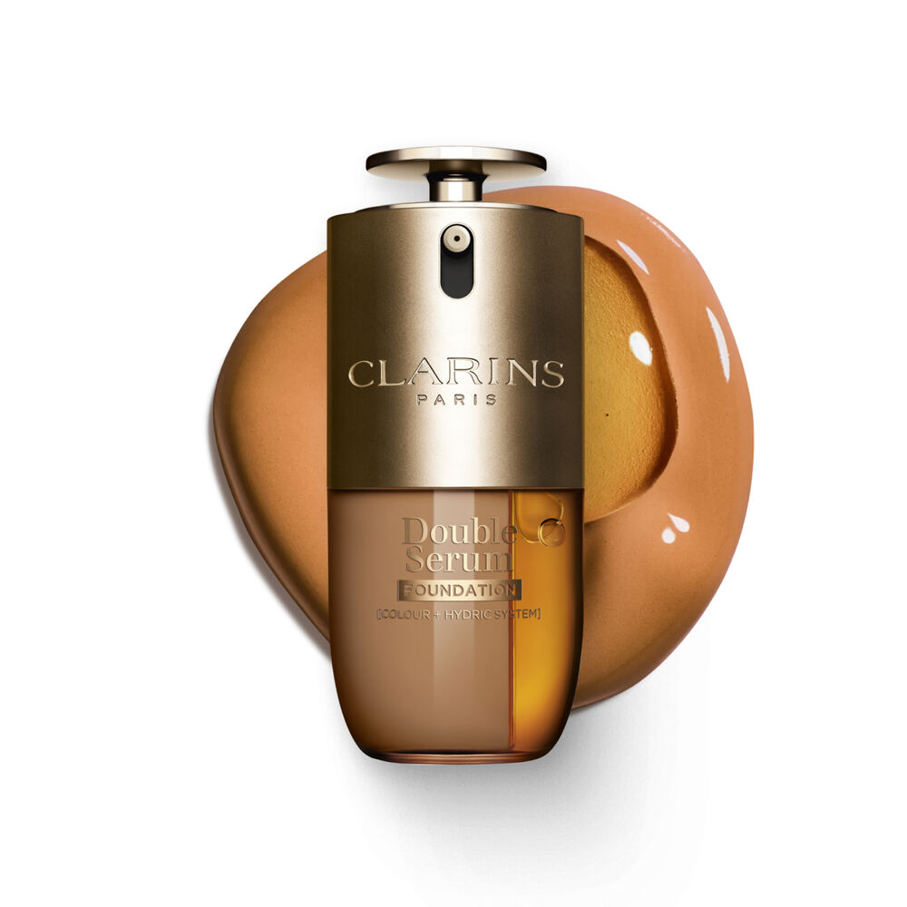 Packshot of Clarins Double Serum Foundation available for every skin tone, featuring key ingredients turmeric and papain 