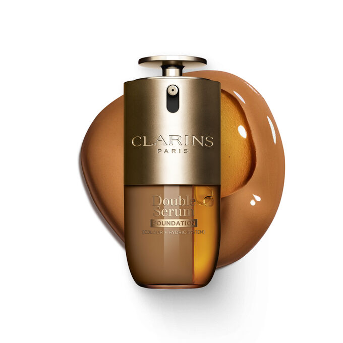 Packshot of Clarins Double Serum Foundation available for every skin tone, featuring key ingredients turmeric and papain 