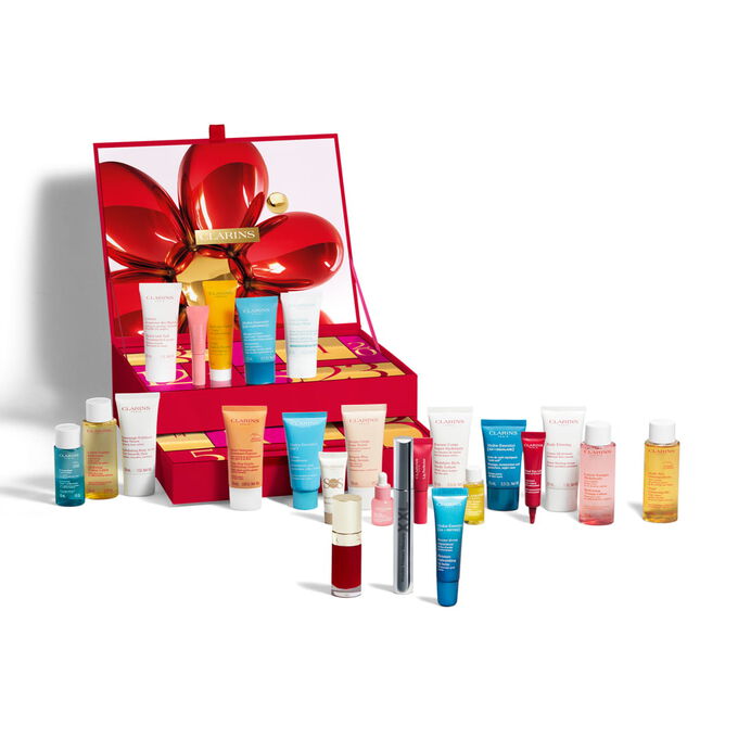 Clarins 24 day beauty advent calendar filled with skincare bodycare and makeup full size and travel minis in red box.