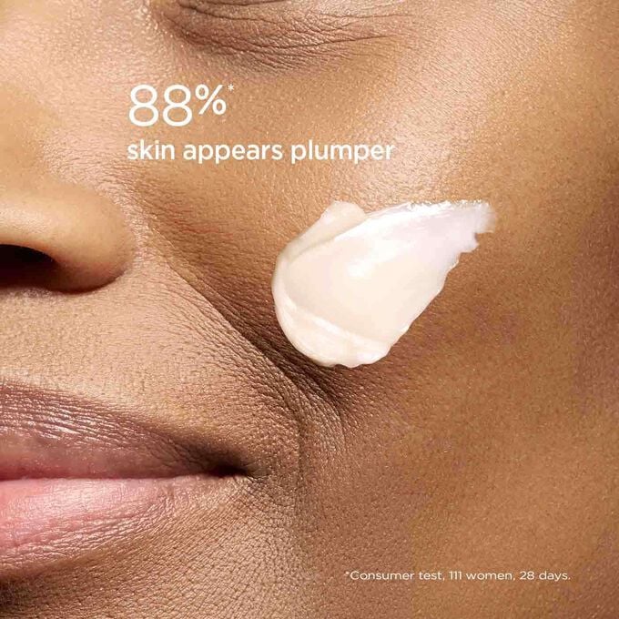 Close-up of a woman's cheek showing 88% of users found Clarins Multi-Intensive Day Cream made their skin look visibly plumper.