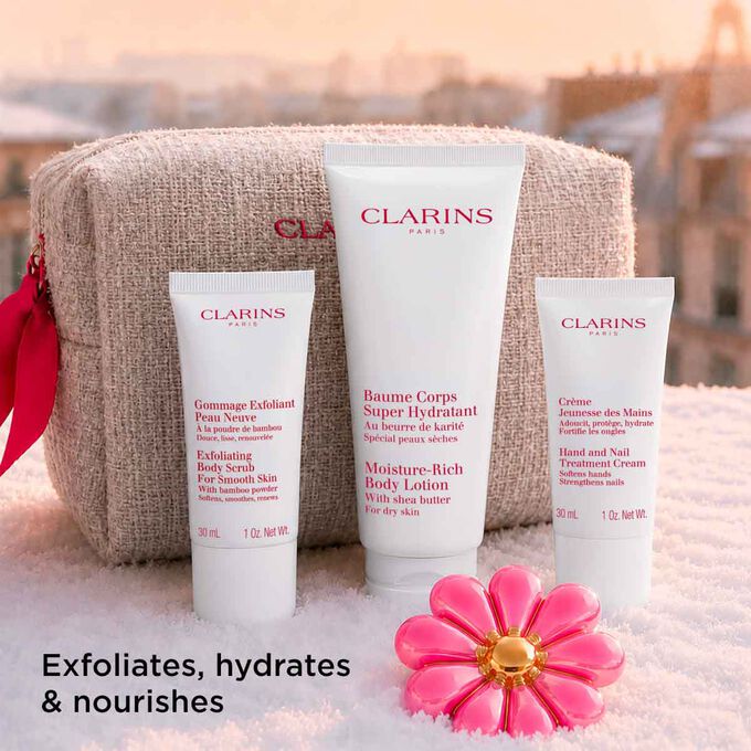 Body care routine set with rich body lotion scrub and hand cream to exfoliate hydrate and nourish dry skin every day.