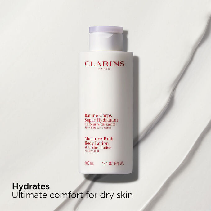 Packshot of Clarins Moisture-Rich Body Lotion with text emphasising the nourishing effect of the product on dry skin.