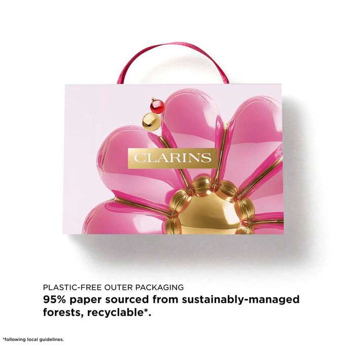 Clarins Lip Oils Christmas gift set with text highlighting a pouch made from 87% recycled fibres for a sustainable holiday gift