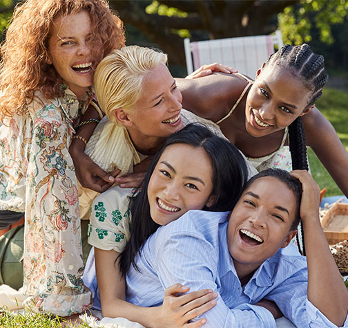 Five people laughing 