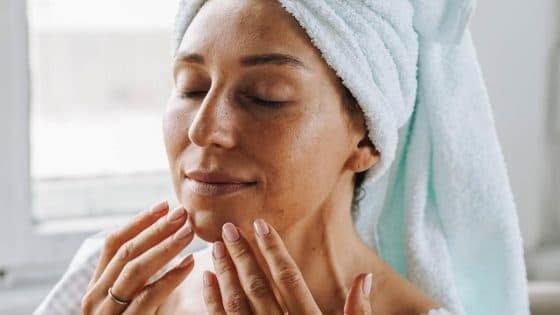 A woman doing skincare A woman doing skincare